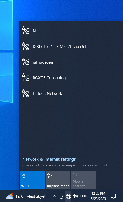 Wi-Fi network list dropdown on a Windows interface showing various network names and connection status.
