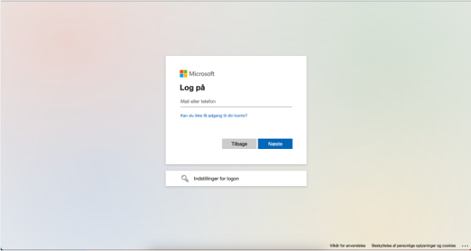 Microsoft login screen asking for email or phone number with 'Next' button visible.