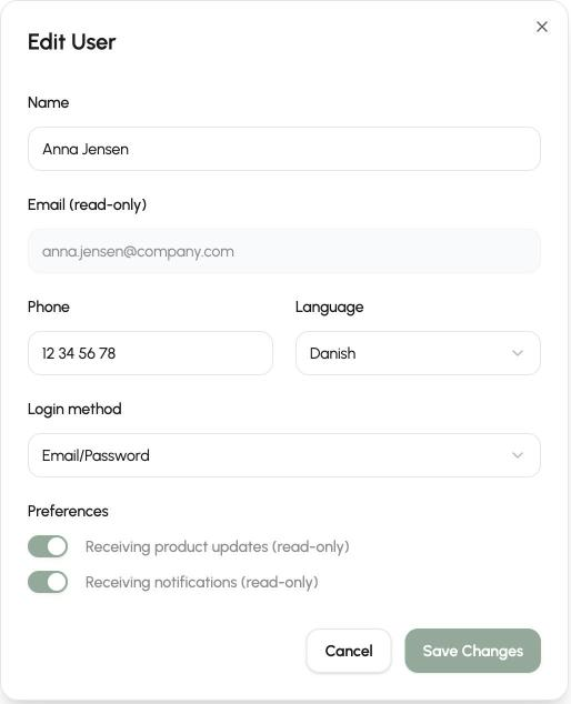 The Edit User window in Q-Play with the fields Name, Email (read-only), Phone, Language and Login method